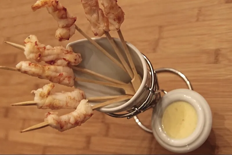 Crevettes au beurre, orange & gingembre